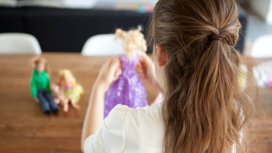 barbie movie lgbtq inclusivity little girl playing with dolls