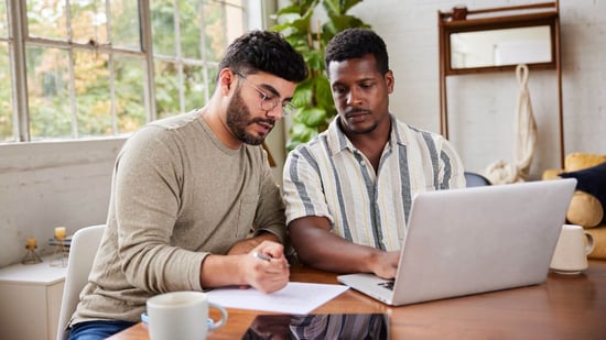 gay male couple financial planning open enrollment insurance